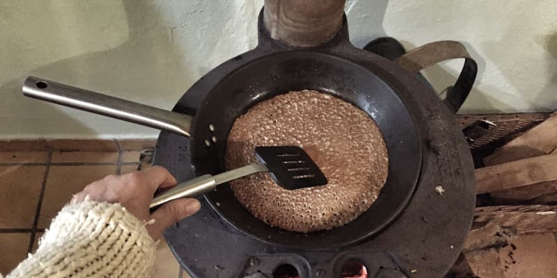 Non alcoholic IPA beer brewing starts with mashing the grains in hot water, to release fermentable sugars.