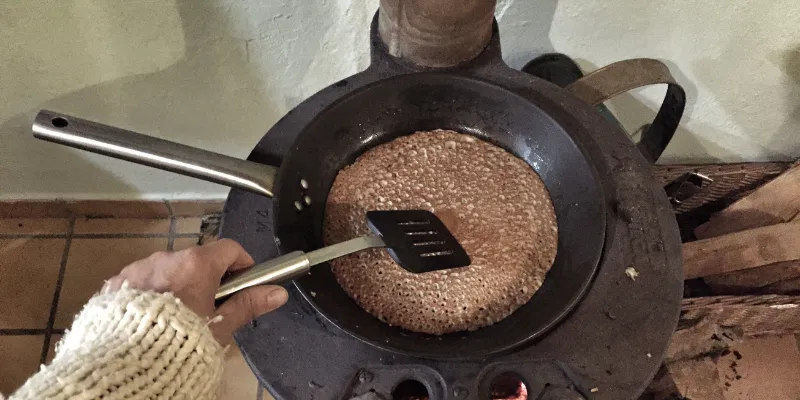 Non alcoholic IPA beer brewing starts with mashing the grains in hot water, to release fermentable sugars.